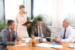 Photo: business woman and businessmen working business woman and businessmen working