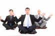 Businessmen meditating on white