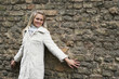 Young Happy Woman In White Fur Coat Young Happy Woman In White Fur Coat