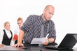 busy businessman in his office