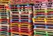 Piles of colorful wooden pallets