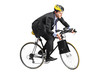 Photo: A young businessman riding a bicycle going towards his workplace A young businessman riding a bicycle going towards his workplace