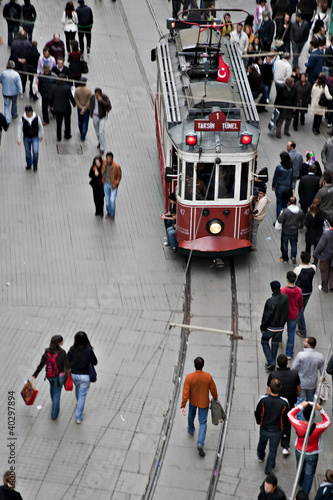 Photo: Istanbul, Turkey - October 18, 2008: Tram and walking people, Is Istanbul, Turkey - October 18, 2008: Tram and walking people, Is
