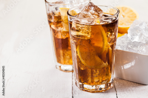 Photo: Lemon Ice Tea on white wooden table Lemon Ice Tea on white wooden table