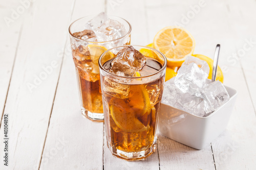 Photo: Lemon Ice Tea on white wooden table Lemon Ice Tea on white wooden table