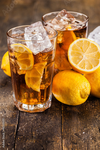 Photo: Lemon Ice Tea on wooden table Lemon Ice Tea on wooden table