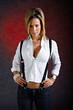Young woman wearing sexy clothes with suspenders