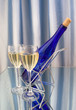 Two glasses of wine and blue bottle Two glasses of wine and blue bottle