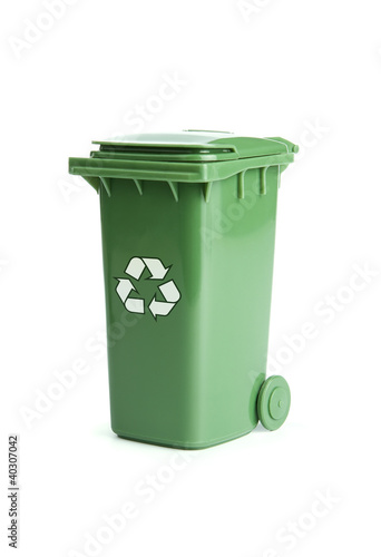 Photo: Green garbage, trash bin isolated on white background Green garbage, trash bin isolated on white background
