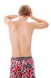 A young man grasping his head where the pain is