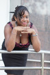 Woman leaning on the rail
