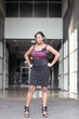 Woman posing akimbo
