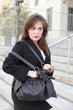 Businesswoman and a handbag Businesswoman and a handbag