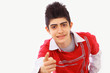 Boy pointing happy playful expression