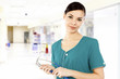 Photo en ligne au meilleur prix Cute female doctor in a hospital.