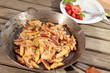 Schupfnudeln mit Kraut und Speck in der Pfanne
