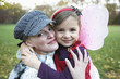 Mother with daughter, smiling, portrait