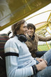 Friends enjoying in airplane