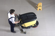 cleaning floor with machine