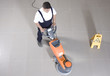 cleaning floor with machine