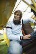 Young man sitting in airplane