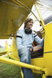 Young man sitting in airplane