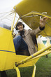 Young man sitting in airplane
