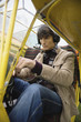 Young man sitting in airplane
