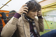 Young man sitting in airplane