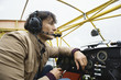 Young man sitting in airplane