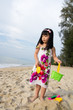 Little girl playing sand