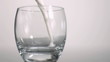 Milk poured in super slow motion