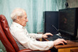 Senior Man And Computer