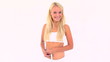 Blonde woman measuring her waist