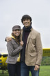 Young couple smiling, portrait