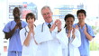 Medical team clapping their hands