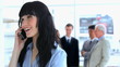 Brunette businesswoman talking on the phone
