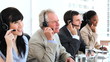 Happy business team using headsets