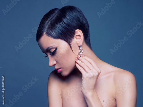 Photo: Sensual lady with diamond earring Sensual lady with diamond earring