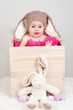 Baby girl with Easter eggs and bunny Baby girl with Easter eggs and bunny