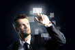 business man pressing a virtual button