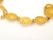 Photo: Yellow gold jewellry, isolated towards white background Yellow gold jewellry, isolated towards white background