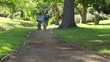 Smiling family riding bikes on a pathway