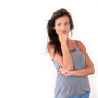 Charming young woman standing on white background, isolated