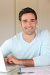 Portrait of smiling man working from home