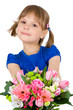 little girl with a bouquet of flowers. isolated on white