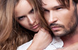 Portrait of beautiful couple touching each other