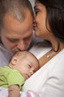 Mixed Race Young Family with Newborn Baby