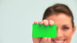 Beautiful woman showing her business card