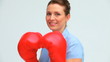 Woman with tied hair boxing